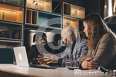 business meeting. Discussion of the start-up of the project. Young multiracial programming team Stock Photo