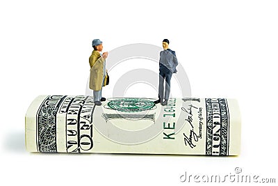 Business meeting, standing on one hundred dollar banknote and making economic decisions Stock Photo