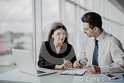 Business meeting. Two professionals signing contract. Office work. Stock Photo