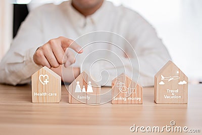 Business men are thinking hard about choosing a home family frist and saving money. Stock Photo