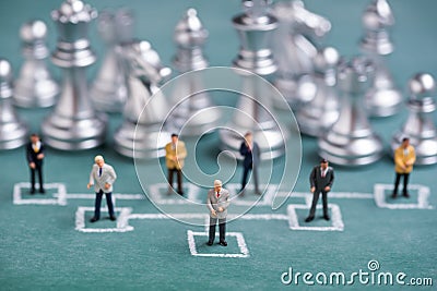 Business miniature people in chalk organization chart Stock Photo