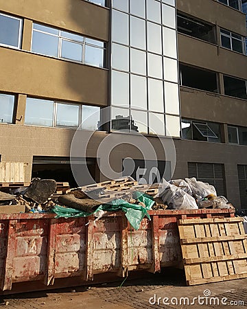 Business office overhaul, repair and finishing, construction garbage collector Stock Photo