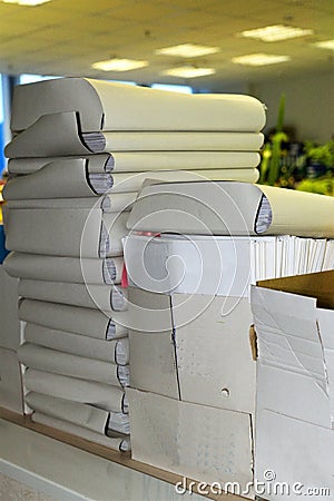 Business papers in folders in the office on the shelves. Stock Photo