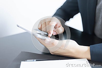 Business partners concept a young businessman creating profit summary of the recent month showing in document forms Stock Photo