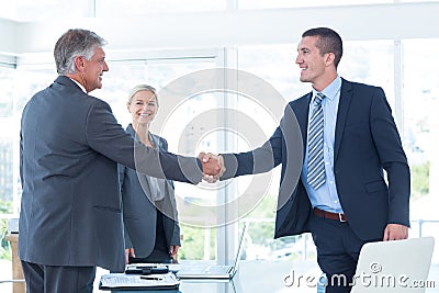 Business partners shaking hands Stock Photo