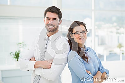 Business partners smiling and posing together Stock Photo
