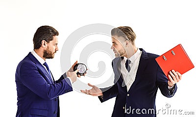 Business partners with tense faces argue about deadline. Stock Photo
