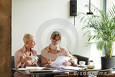 Business partners working with contract Stock Photo