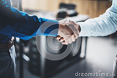 Business partnership handshake concept.Closeup photo of two businessmans handshaking process.Successful deal after great Stock Photo