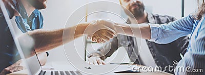 Business partnership handshake concept. Photo two coworkers handshaking process. Successful deal after great meeting Stock Photo