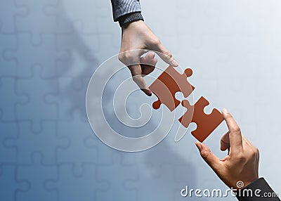 Business Partnership or Teamwork Concept. Hands of two People Tr Stock Photo