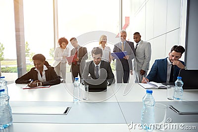 Business people analyzing management Stock Photo