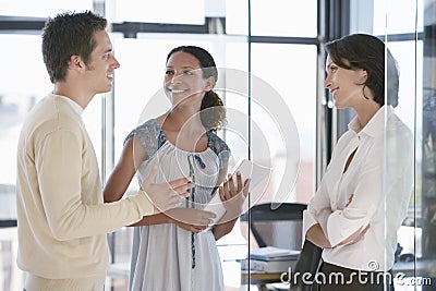 Business People Communicating In Office Stock Photo