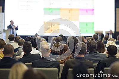 Business People Concept and Ideas. Large Group of People at the Conference Watching Presentation Charts Editorial Stock Photo