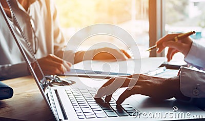 Business people or doctor talking to customer and using laptop a Stock Photo