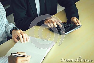 Business people doing finance analysis working together at home office Stock Photo