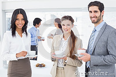 Business people enjoying their drinks Stock Photo