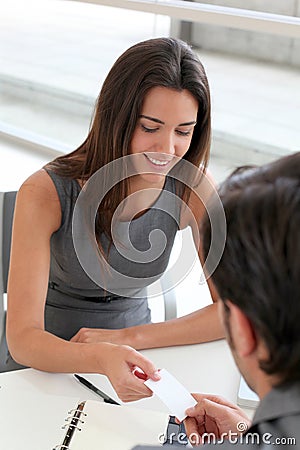 Business people exchanging contacts Stock Photo