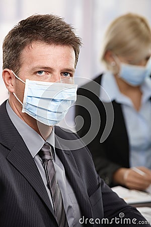 Business people fearing h1n1 virus Stock Photo