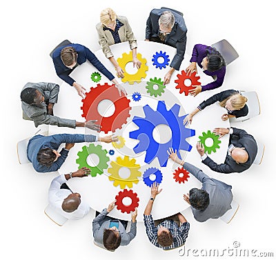 Business People with Gears and Teamwork Concept Stock Photo