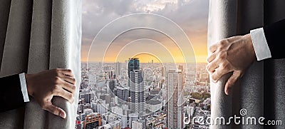 Business people hand opening curtain with Osaka city view in the morning sunrise. New day concept Stock Photo