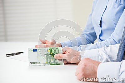 Business people hands with euro banknotes Stock Photo