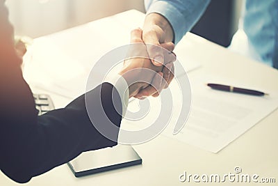 Business people handshake after partnership contract signing Stock Photo