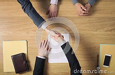 Business people handshaking after signing an agreement Stock Photo