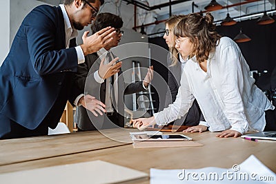 Business people having discussion, dispute or disagreement at meeting or negotiations Stock Photo