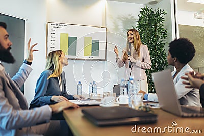 Business people having a meeting or presentation and seminar in the office. Portrait of a young business woman leader Stock Photo