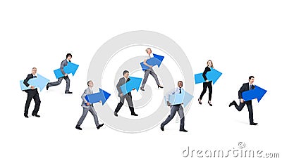 Business People Holding Blue Arrow Signs Stock Photo