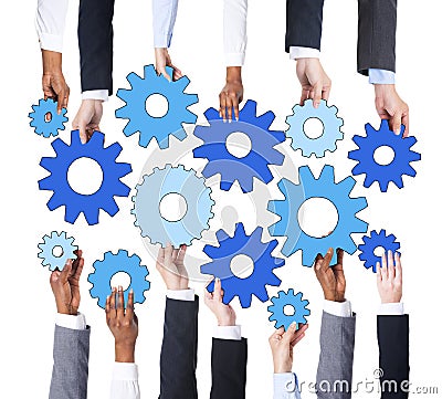 Business People Holding Machine Parts Stock Photo