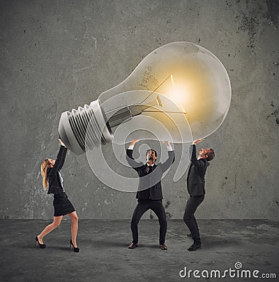 Business people hold a light bulb. concept of new idea and company startup Stock Photo