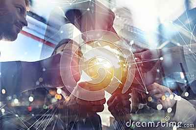 Business people join puzzle pieces in office. Concept of teamwork and partnership. double exposure with internet network Stock Photo