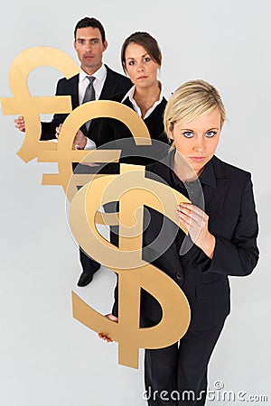 Business People Man and Women Holding Currency Pound Dollar Euro Symbols Stock Photo