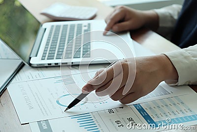 Business People Meeting Design Ideas with pen analyzing financial documents professional investor working new start up project. Editorial Stock Photo