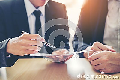 Business people Meeting negotiating a contract between two colleagues Stock Photo