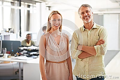 Business people, office and man with woman, portrait and confidence with teamwork, collaboration and partnership. Staff Stock Photo