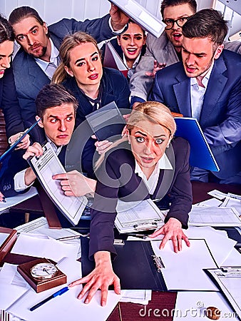 Business people office. Team people are unhappy with their leader. Stock Photo