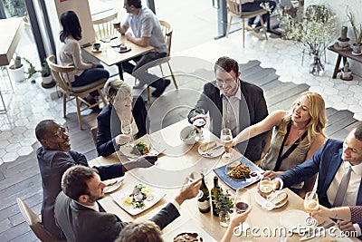 Business People Party Cheers Enjoying Food Concept Stock Photo
