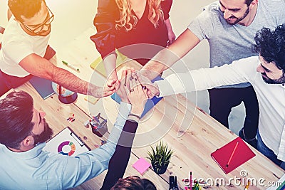 Business people putting their hands together. Concept of integration, teamwork and partnership Stock Photo