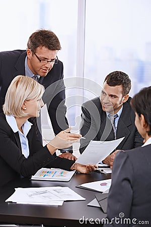 Business people reviewing contract Stock Photo