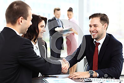 Business people shaking hands, finishing up meeting Stock Photo