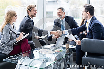 Business people shaking hands, finishing up a meeting. Handshake. Business concept. Stock Photo