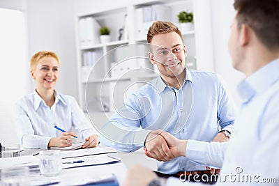 Business people shaking hands, finishing up a Stock Photo