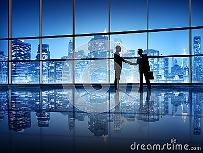 Business People Shaking Hands in New York City Stock Photo