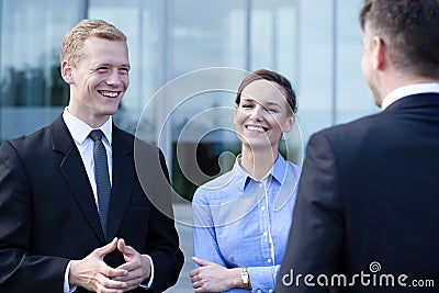 Business people during small talk Stock Photo