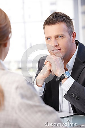 Business people talking at desk Stock Photo