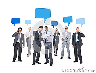 Business People Using Technological Devices Stock Photo