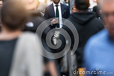 Business people walking from the job in busy city street. Editorial Stock Photo